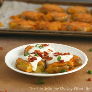These loaded Smashed Potatoes are a fun and delicious twist on boring boiled potatoes. They are a huge family favorite and so easy to make!
