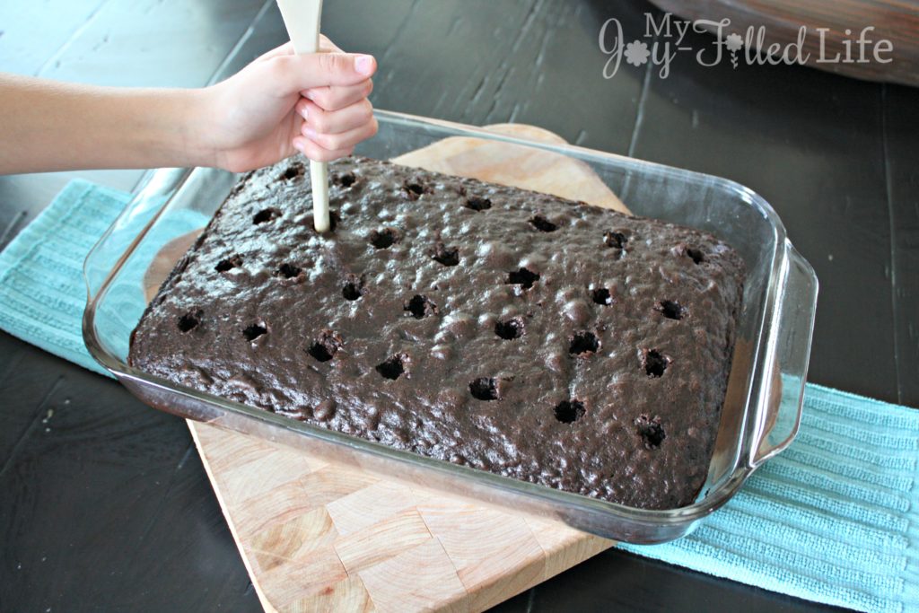 Chocolate Butterfinger Poke Cake