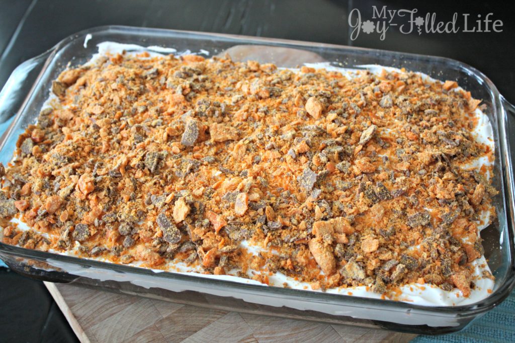 Chocolate Butterfinger Poke Cake