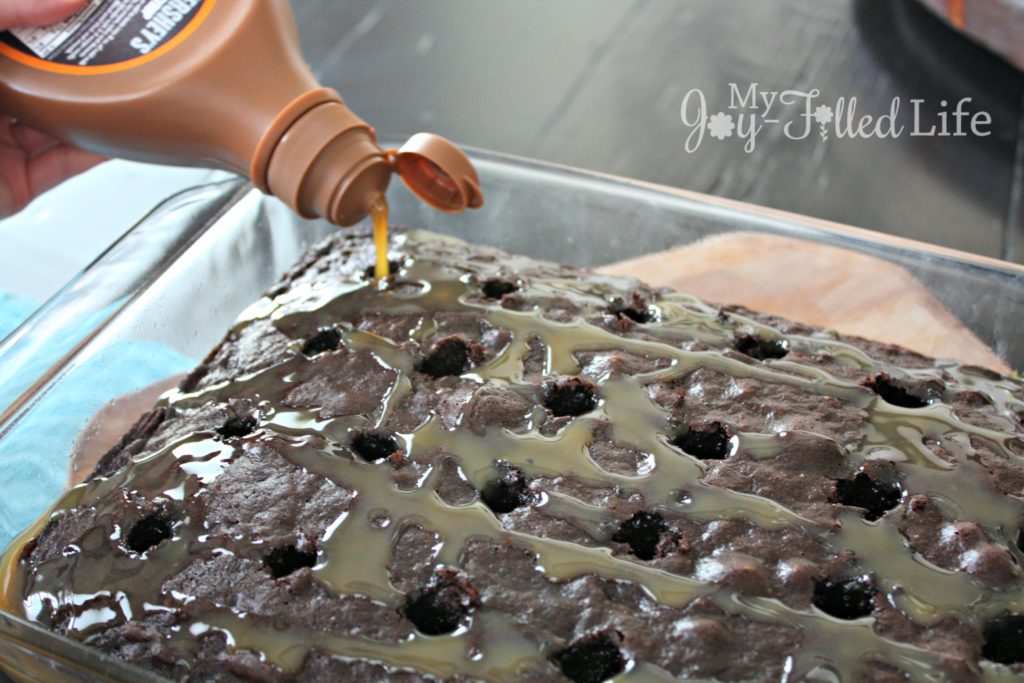 Chocolate Butterfinger Poke Cake