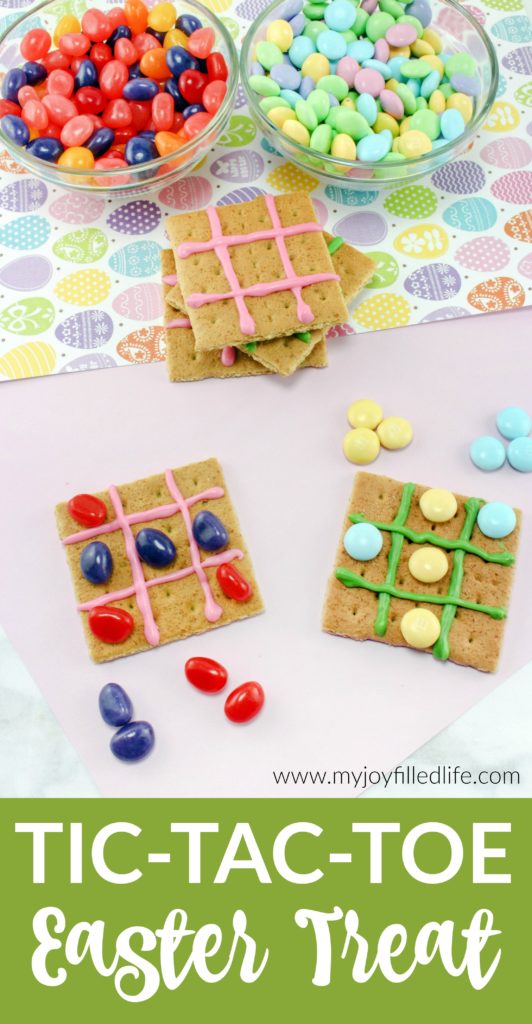 Get a little crafty with your candy this year and make some Easter Tic Tac Toe treats. Grab an opponent, pick your jelly bean or M&M colors, and play with your food! #easter #eastertreat #tictactoe 
