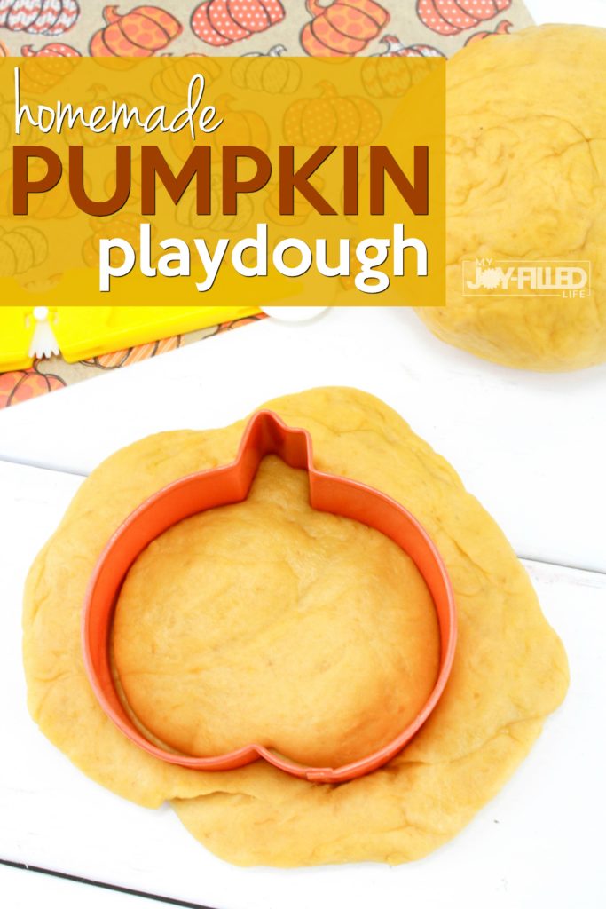 With just 3 simple ingredients and a few short moments of time, you'll have homemade pumpkin playdough that will smell just like pumpkin pie. #playdough #pumpkin #sensoryplay