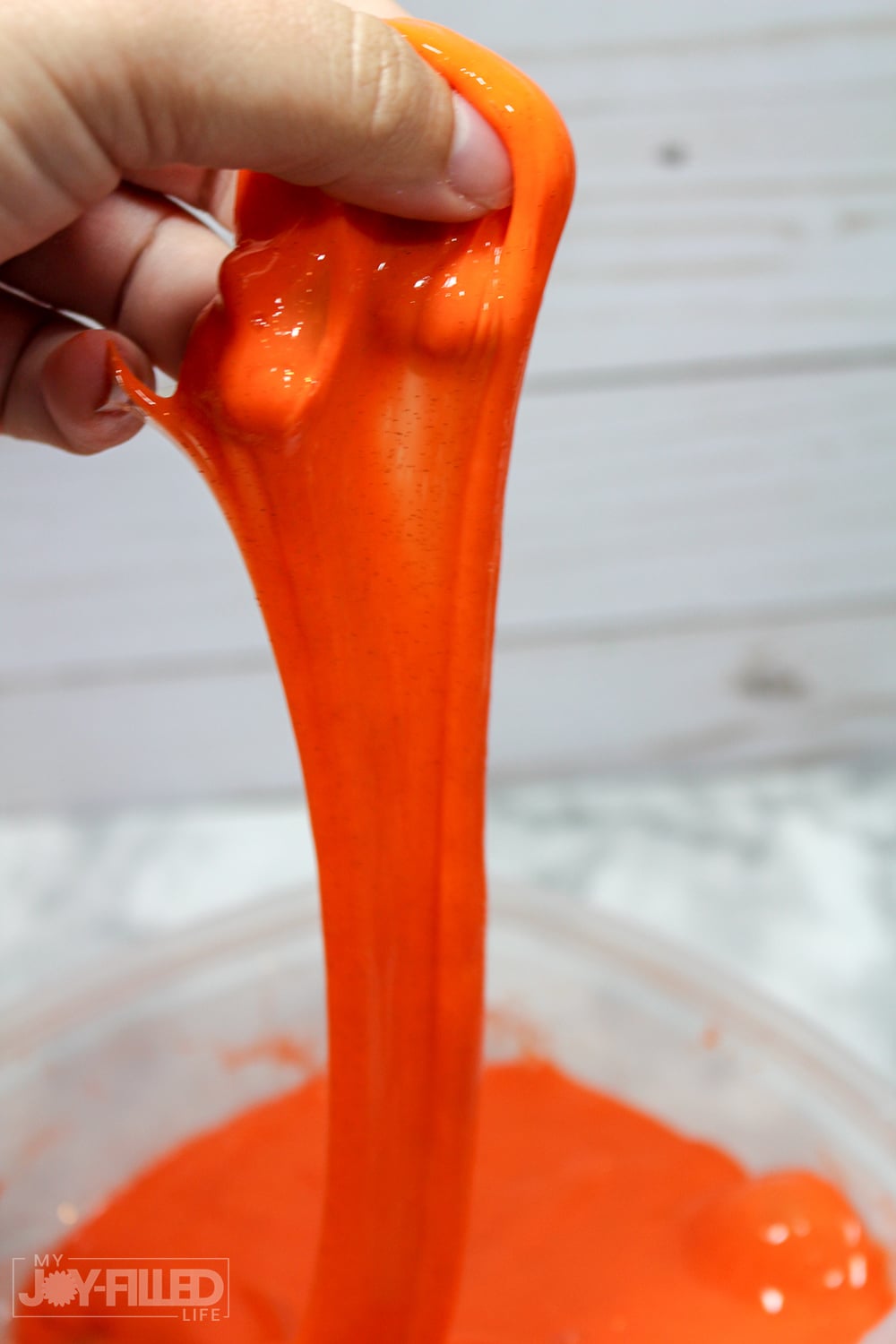 This candy corn slime is the PERFECT slime recipe for fall! It's such a fun diy slime and the kids are sure to have so much fun playing with this one. This is a slime recipe with contact solution so it is sure to make the PERFECT slime to play!