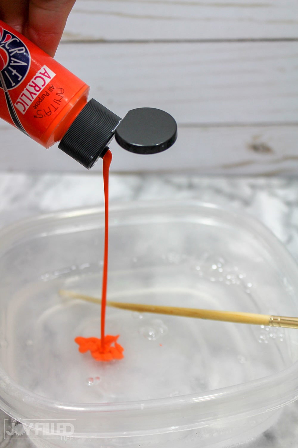 This candy corn slime is the PERFECT slime recipe for fall! It's such a fun diy slime and the kids are sure to have so much fun playing with this one. This is a slime recipe with contact solution so it is sure to make the PERFECT slime to play!