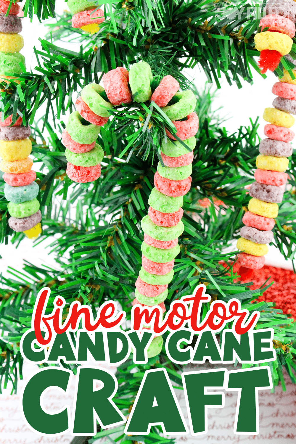 This fine motor candy cane craft is a great Christmas activity for little ones. They make for great ornaments or gifts too! #Christmascraft #homemadeornaments #christmasornaments #finemotor #finemotorskills