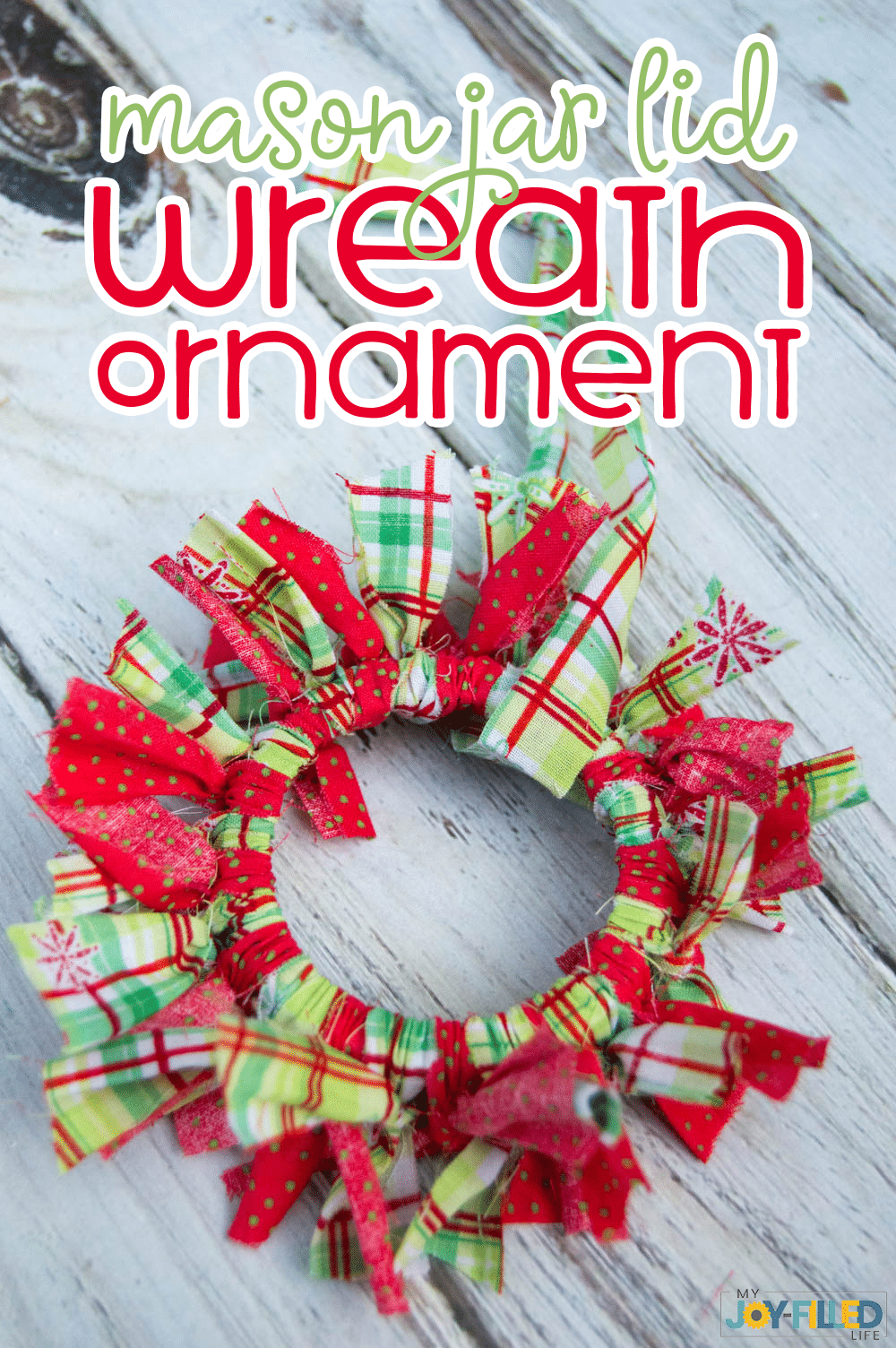 This mason jar lid wreath ornament is such a fun and easy homemade Christmas ornament! It makes a great gift and kids will love helping with this one. #Christmas #homemadechristmas #christmasornament #masonjar