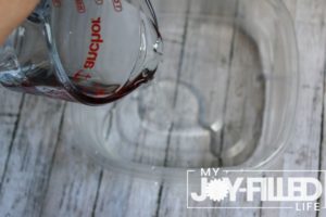 adding in the water to the contact solution for slime