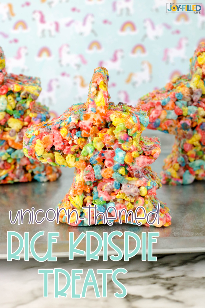 Unicorn fans everywhere will LOVE these unicorn rice krispie treats! They're gooey, sweet, and so delicious and fun! Perfect for your next unicorn party! #unicorn #unicorntreat #unicornparty