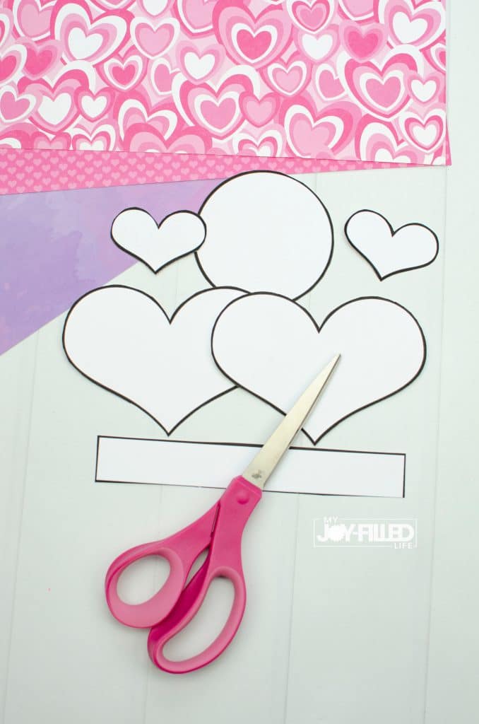 Cut out heart templates and scissors for Valentine craft
