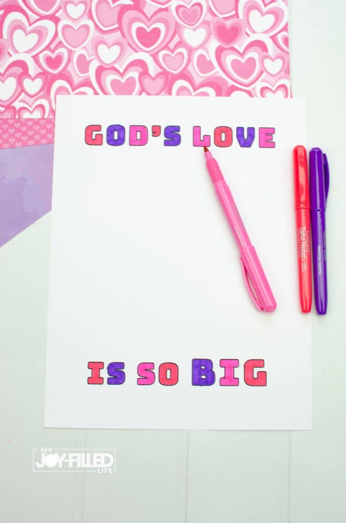 Words God's Love is So BIG colored in with pink, red,and blue markers. 