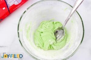 Mixing Up Homemade Green Playdough