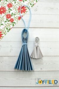 paper accordions tied with yarn