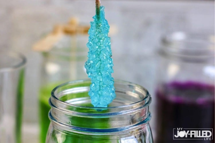 Pulling Homemade Rocky Candy Stick Out of Jar
