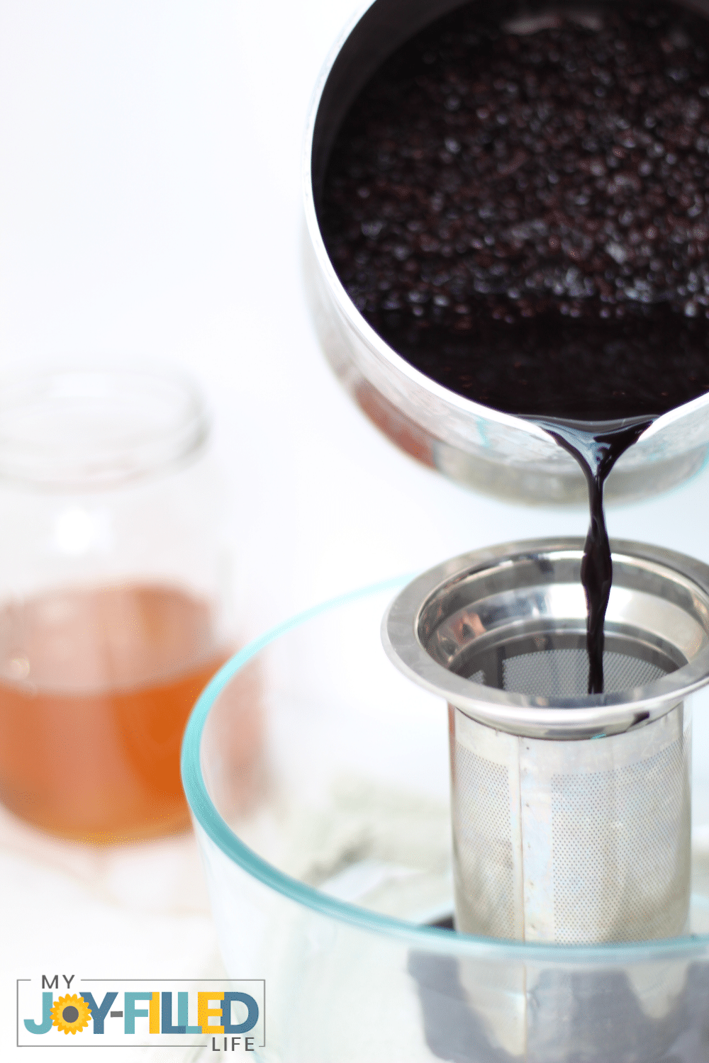 Straining the elderberries