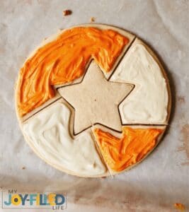 Frosting the Puzzle Cookie