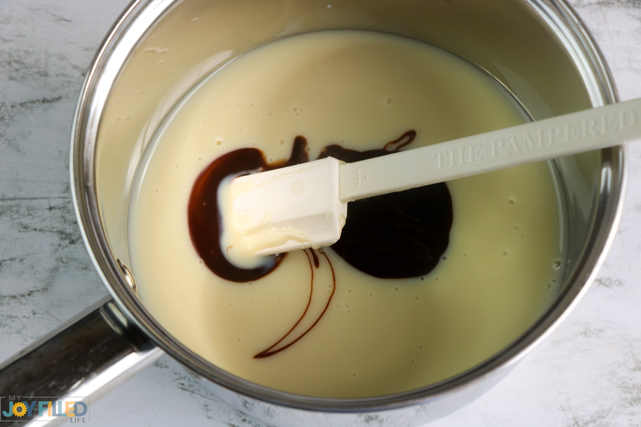 Mixing Edible Chocolate Slime in a Saucepan