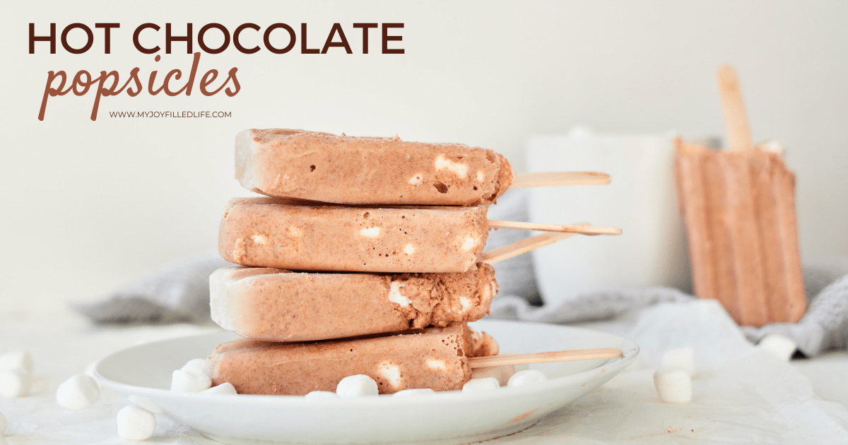 Hot Chocolate Popsicles on a plate from the side