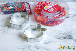 supplies needed for Melted Beads Apple Suncatcher Craft
