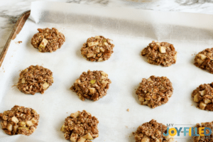 scooping cookies onto baking sheet