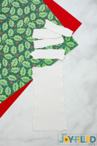cutting small strips of paper