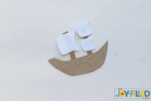 gluing on the sails