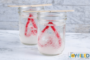 adding the mixture to the jars