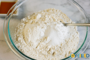 whisking together dry ingredients
